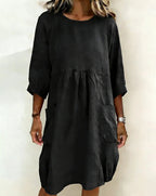 Fashionable, casual, minimalist, loose-fitting dress with three-quarter sleeves