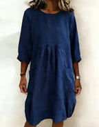 Fashionable, casual, minimalist, loose-fitting dress with three-quarter sleeves
