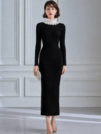 Ruffled High-Neck Ribbed Knit Maxi Dress