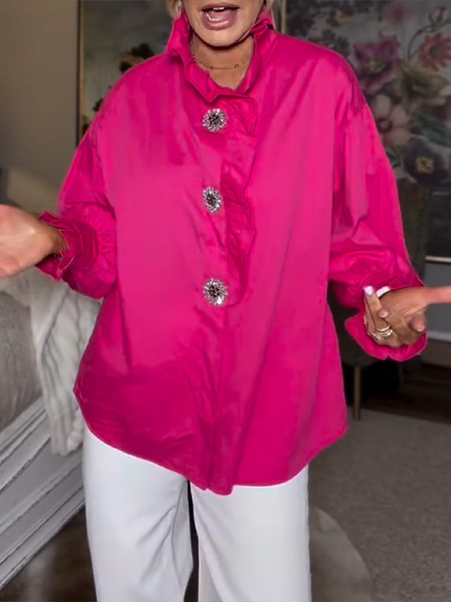 Stylish And Casual Long-sleeved Cotton Shirt With Rhinestone Buttons And A Ruffled Collar.