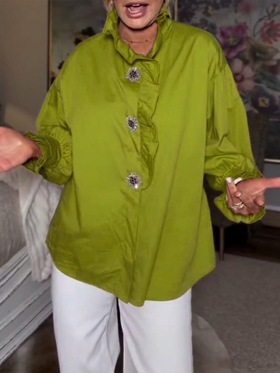 Stylish And Casual Long-sleeved Cotton Shirt With Rhinestone Buttons And A Ruffled Collar.