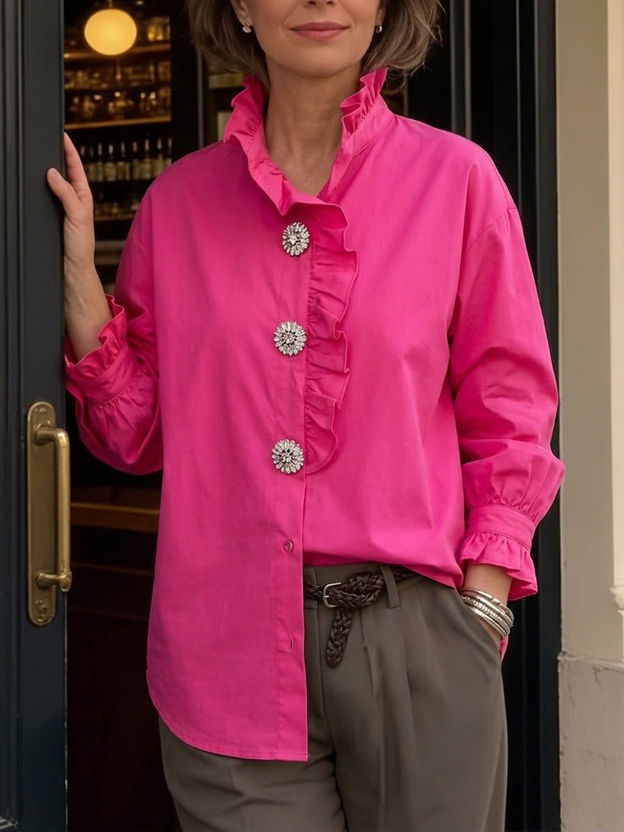 Stylish And Casual Long-sleeved Cotton Shirt With Rhinestone Buttons And A Ruffled Collar.