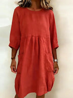 Fashionable, casual, minimalist, loose-fitting dress with three-quarter sleeves